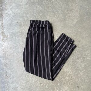 Black and white striped trousers
Tailored pants